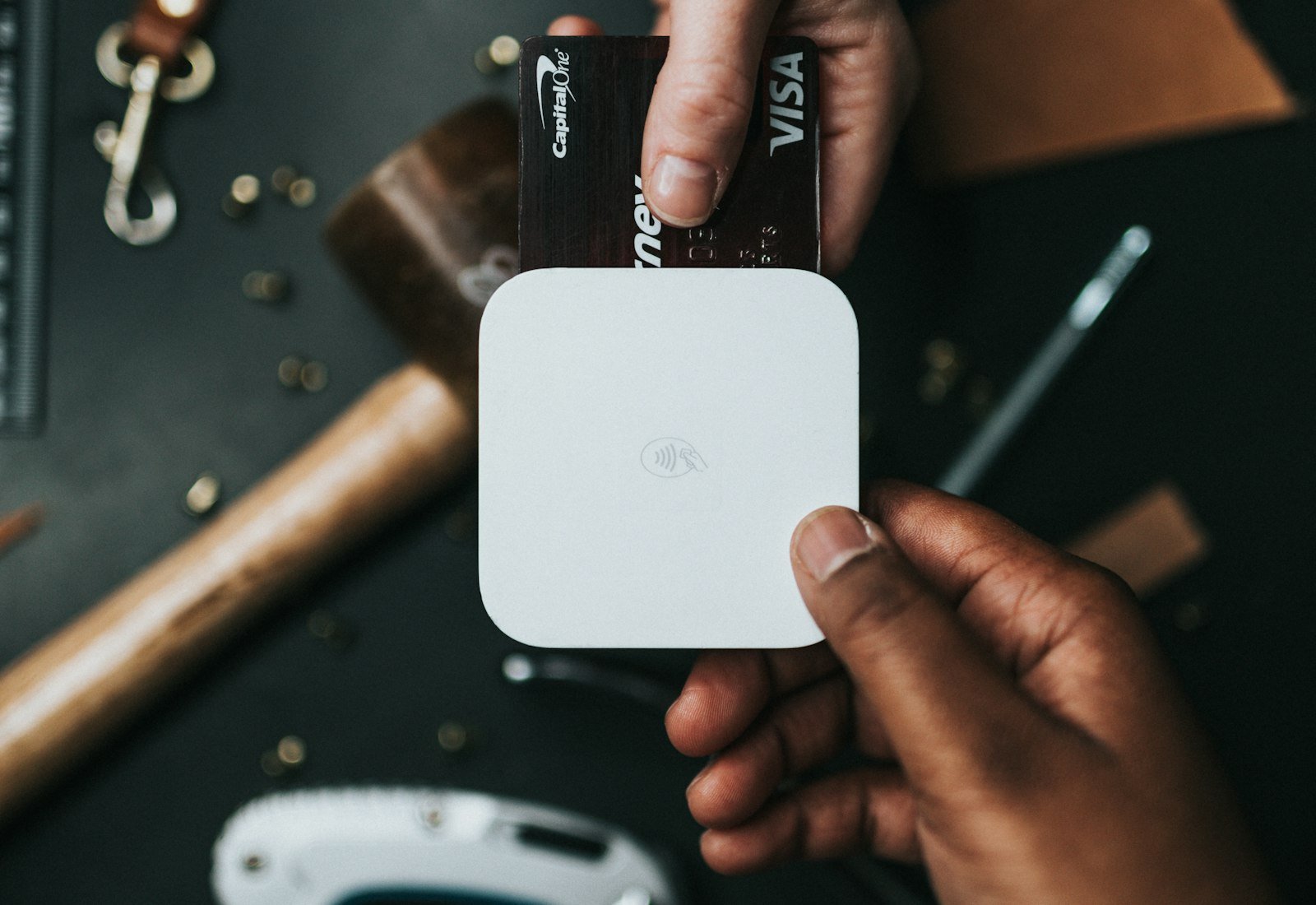Person shopping with a credit card and smartphone for easy payment