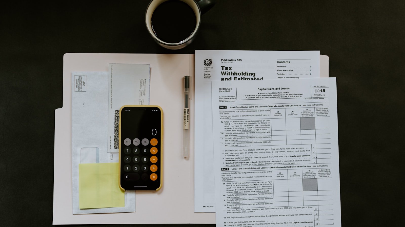 Person reviewing financial paperwork